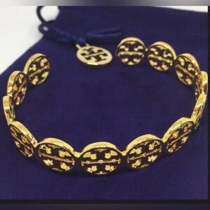 NWT authentic  Tory Burch
18K Gold plated Logo Cuff